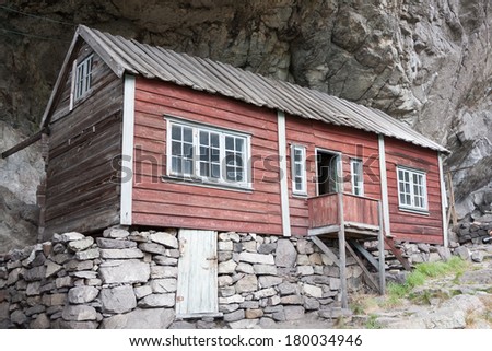 Helleren (Jossingfjorden, Sokndal, Norway). Ancient houses beneath an overhanging rock (heller) along road 44.