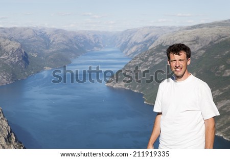Dutch man high above Preikestolen (Norway)