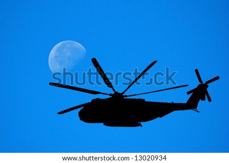 Military Helicopter Silhouetted against Moon and Sky (Sikorsky VH-3 Sea King)