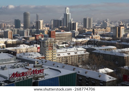 YEKATERINBURG, RUSSIA - FEBRUARY 22, 2011: Panoramic view with modern skyscrapers and Soviet era dwelling blocks in Yekaterinburg, Russia.