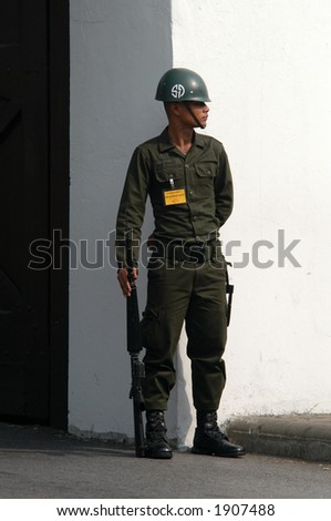 Thai soldier in front of the Royal palace in Bangkok, Thailand