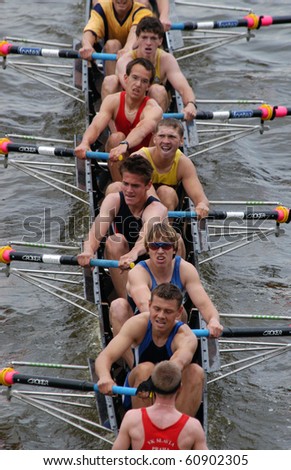 PRAGUE - JUNE 6: Junior rowing team rowing ahead during a traditional annual boat-race in Prague, Czech Republic, on June 6, 2010