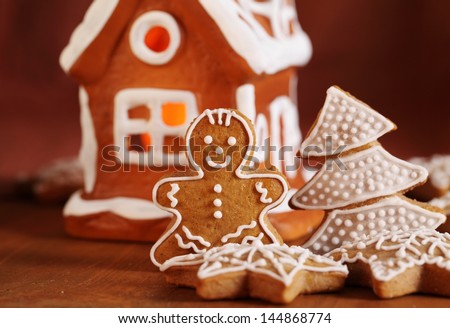 Gingerbread cookies and decorations. Focus on gingerbread man