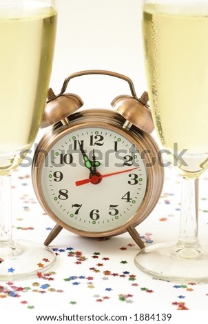 Happy New Year - alarm-oÂ´clock and champagne