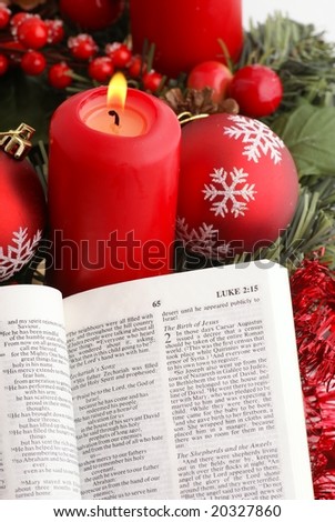 Opened Bible with christmas story and christmas decorations