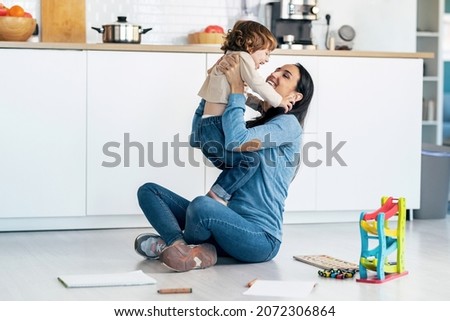 Similar – Image, Stock Photo Mother playing with toddler