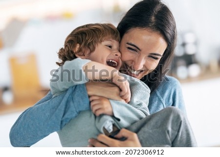 Similar – Image, Stock Photo young mother playing with baby girl outdoors in a park, happy family concept. love mother daughter