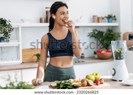 Similar – Foto Bild Frau bereitet Essen in der Küche vor.