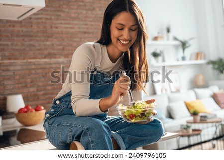 Similar – Image, Stock Photo Young woman eating strawberry dessert in cafe