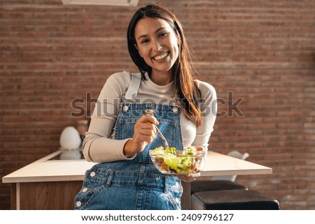 Similar – Image, Stock Photo Young woman eating strawberry dessert in cafe