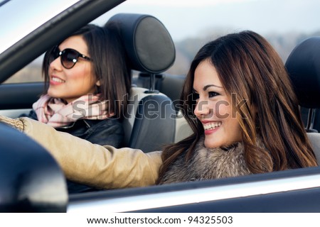 two good friends traveling in a convertible car Foto stock © 