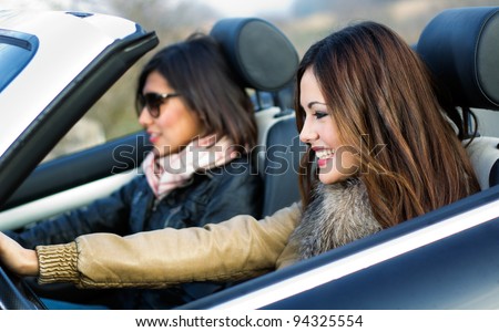 two good friends traveling in a convertible car Foto stock © 