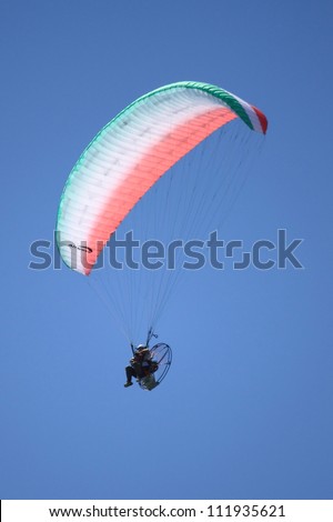 ROME - JUNE 3: A powered paraglider perform at the Rome International Air Show on June 3, 2012 in Rome, Italy