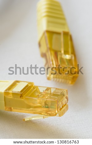 Yellow LAN cable plugs for internet communication