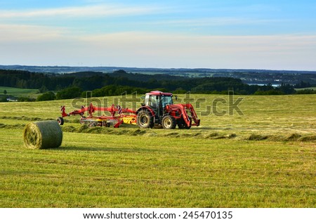 Farm tractor on a field