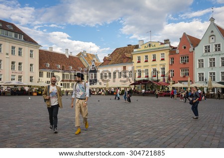 TALLINN - SEPTEMBER 10: Colorful buildings of Town Hall Square on September 10, 2013, TALLINN, ESTONIA. Old Town is listed in the UNESCO World Heritage List