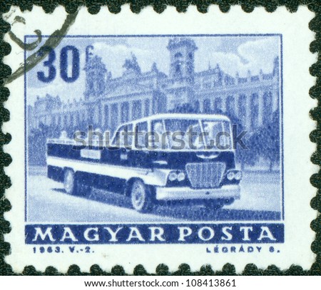 HUNGARY - CIRCA 1963: A stamp printed in the Hungary shows Sightseeing bus and National Museum, series transportation, circa 1963