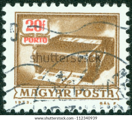 HUNGARY - CIRCA 1973: A stamp printed in Hungary shows Money order Canceling Machine, without inscription, from the series \