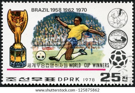 NORTH KOREA - CIRCA 1978: A Stamp printed in NORTH KOREA shows the Soccer players, Cup, Emblem and Globe, Brazil (1958,1962,1970), World Cup Winners, circa 1978