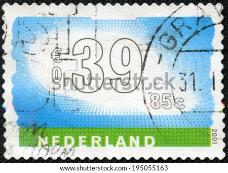 NETHERLANDS - CIRCA 2001: Stamp of the Netherlands with an abstract, colour background, circa 2001.