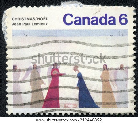 CANADA - CIRCA 1974: A stamp printed in the Canada shows Nativity, Painting by Jean Paul Lemieux, Christmas, circa 1974