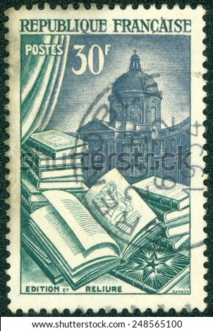 FRANCE - CIRCA 1954: A stamp printed in France dedicated to Book manufacture, in the background of the dome of the French Academy, circa 1954