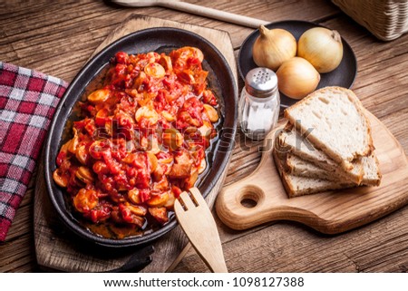 Lecho - tasty Hungarian stew with peppers and sausage. Stock fotó © 