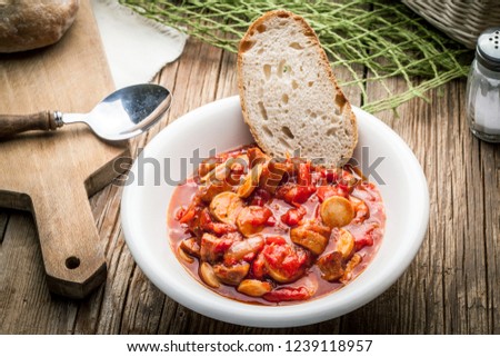 Lecho - tasty Hungarian stew with peppers and sausage. Stock fotó © 