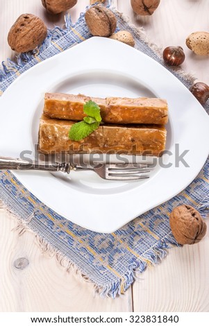 Traditional Arabic sweet dessert - baklava with nuts and honey.