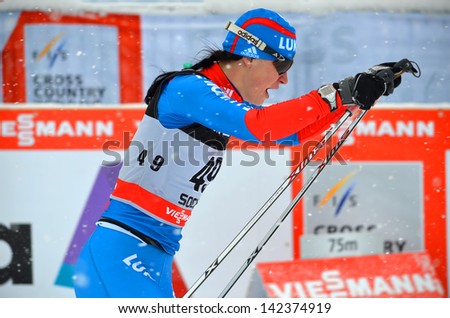 SOCHI, RUSSIA - FEBRUARY 1: Alisa Zhabmalova  competes in the FIS Cross-Country  World Cup on February 1, 2013 in Sochi, Russia. Combined ski and biathlon complex Laura