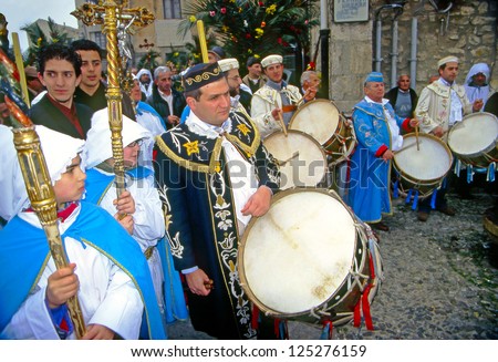 GANGI, SICILY, ITALY - APRIL 4: Easter in Sicily, unidentified participants in religious procession on Palm Sunday on april 4, 2004 in Gangi, Italy.
