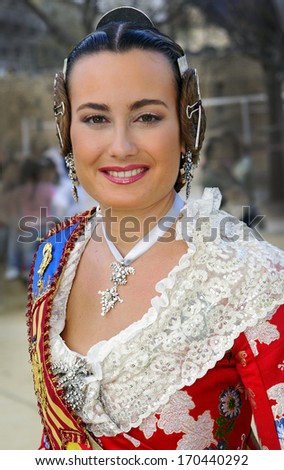 VALENCIA, SPAIN - MARCH 17: Unknown woman, Fallas celebration, one of the biggest parties in Spain where people dresses traditionally, celebration for Saint Joseph on March 17, 2007 in Valencia, Spain