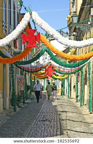 TOMAR, PORTUGAL - JULY 6: Decorating the streets before the holiday Festa dos Tabuleiros on July 6, 2007. It is one of the oldest cultural and religious holidays in Portugal, held the fourth years