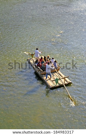 ORAVSKY PODZAMOK, SLOVAKIA - SEPTEMBER 28: Cruise on wooden rafts down the river Orava on September 28, 2008. Orava belongs to one of the most typical natural and historical regions of Slovakia.