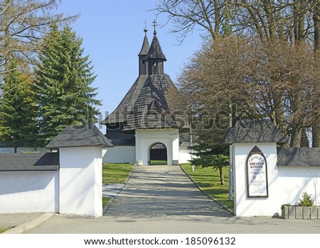TVRDOSIN, SLOVAKIA - MARCH 29: Main fortified gate leading to complex of wooden church of All Saints in Tvrdosin town March 29, 2014. This 15th century church is UNESCO World Heritage Site