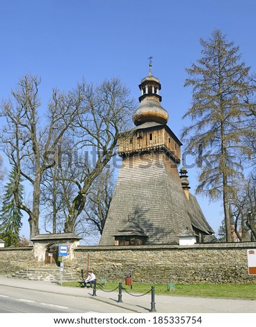 RABKA-ZDROJ, POLAND - MARCH 29: The old wooden church of St. Mary Magdalene on March 29, 2014. The church arose in 1606 and belongs to a set of old wooden churches in Lesser Poland