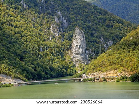 DANUBE GORGE, ROMANIA-AUGUST 18:The Statue of Dacian king Decebalus on August 18, 2012. 40-m high statue that is the tallest rock sculpture in Europe. It is located near the city of Orsova.