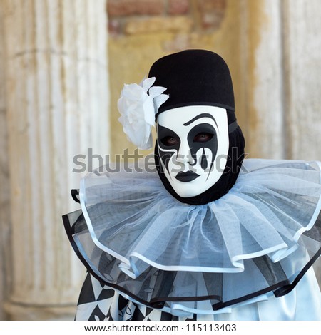 VENICE - FEBRUARY 17: Person in Venetian costume attends the Carnival of Venice, festival starting two weeks before Ash Wednesday on February 17, 2011 in Venice, Italy.