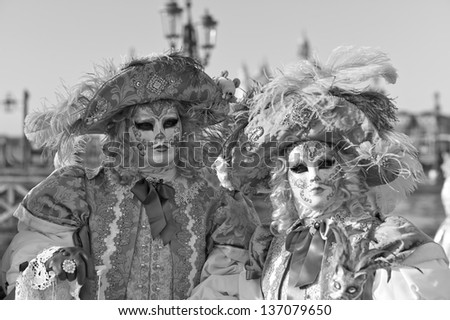 VENICE - FEBRUARY 8: Person in Venetian costume attends the Carnival of Venice, festival starting two weeks before Ash Wednesday on February 8, 2013 in Venice, Italy.