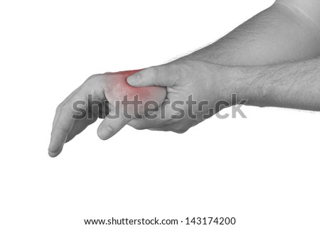 Pain in the wrist. Male holding hand to spot of neck-aches.