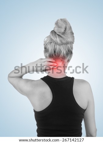 Woman with palm to show pain and injury on neck area. Medical health care concept