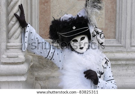 VENICE, ITALY  - MARCH 5: An unidentified person in Venetian costume attends the Carnival of Venice, annual festival starting around two weeks before Ash Wednesday and ends on Shrove Tuesday or Mardi Gras, on March 5, 2011 in Venice, Italy.