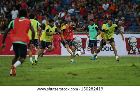 KUALA LUMPUR - AUGUST 9: FC Barcelona \'s players practice during training at the Bukit Jalil National Stadium on August 09, 2013 in Malaysia. FC Barcelona is on an Asia Tour to Malaysia.