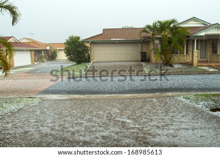 BRISBANE - NOVEMBER 18: Storms dump hail the size of golf-balls on November 18, 2013 in Brisbane, Queensland, Australia. Authorities say the damage bill will run into the millions of dollars.