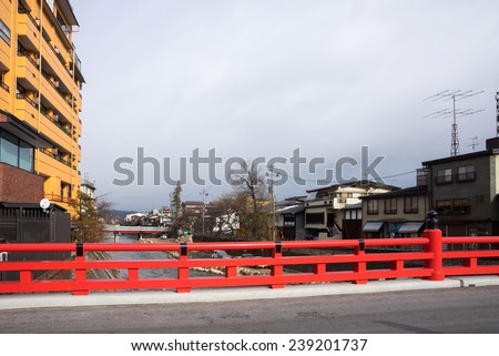 TAKAYAMA, JAPAN - DECEMBER 3, 2014: Low rise buildings and clean river and streets is a common cityscape find in Japan. Strong environmental laws keeps the nation clean and green.