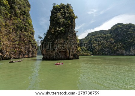 MARCH 12, 2008 - PHUKET, THAILAND: Tourists visit the limestone caves in the islands near Phuket. This is a popular tourist destination and the caves can only be entered from the sea with canoes.