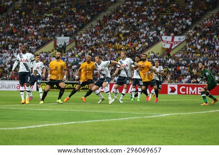 May 27, 2015 - Shah Alam, Malaysia: Malaysian strikers (orange jersey) attacks the Tottenham Hotspur (white jersey) goal in a friendly match. Tottenham Hotspur is on a Asia-Australia tour.