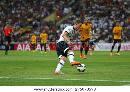 May 27, 2015- Shah Alam, Malaysia: Tottenham Hotspur\'s striker Harry Kane (18) dribbles the ball in the friendly match against the Malaysian Team. Tottenham Hotspur is on a Asia-Australia tour.