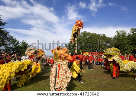 MALACCA - NOVEMBER 1: Lion dance troups gather for a grand performance at the annual Chong Yang festival on Bukit Cina. November 1, 2009 in Malacca, Malaysia.