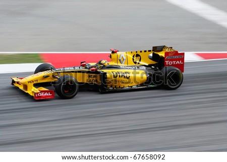 KUALA LUMPUR - APRIL 4: Renault F1 driver Robert Kubica powers down the track on race day at the 2010 Petronas Malaysia Grand-Prix on April 4, 2010 in Sepang International Circuit.